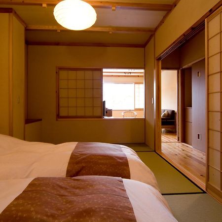Miyama Ouan Kyoritsu Resort Takajama Kültér fotó A room at the hotel