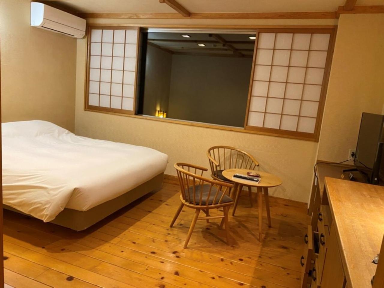 Miyama Ouan Kyoritsu Resort Takajama Kültér fotó A room at a ryokan