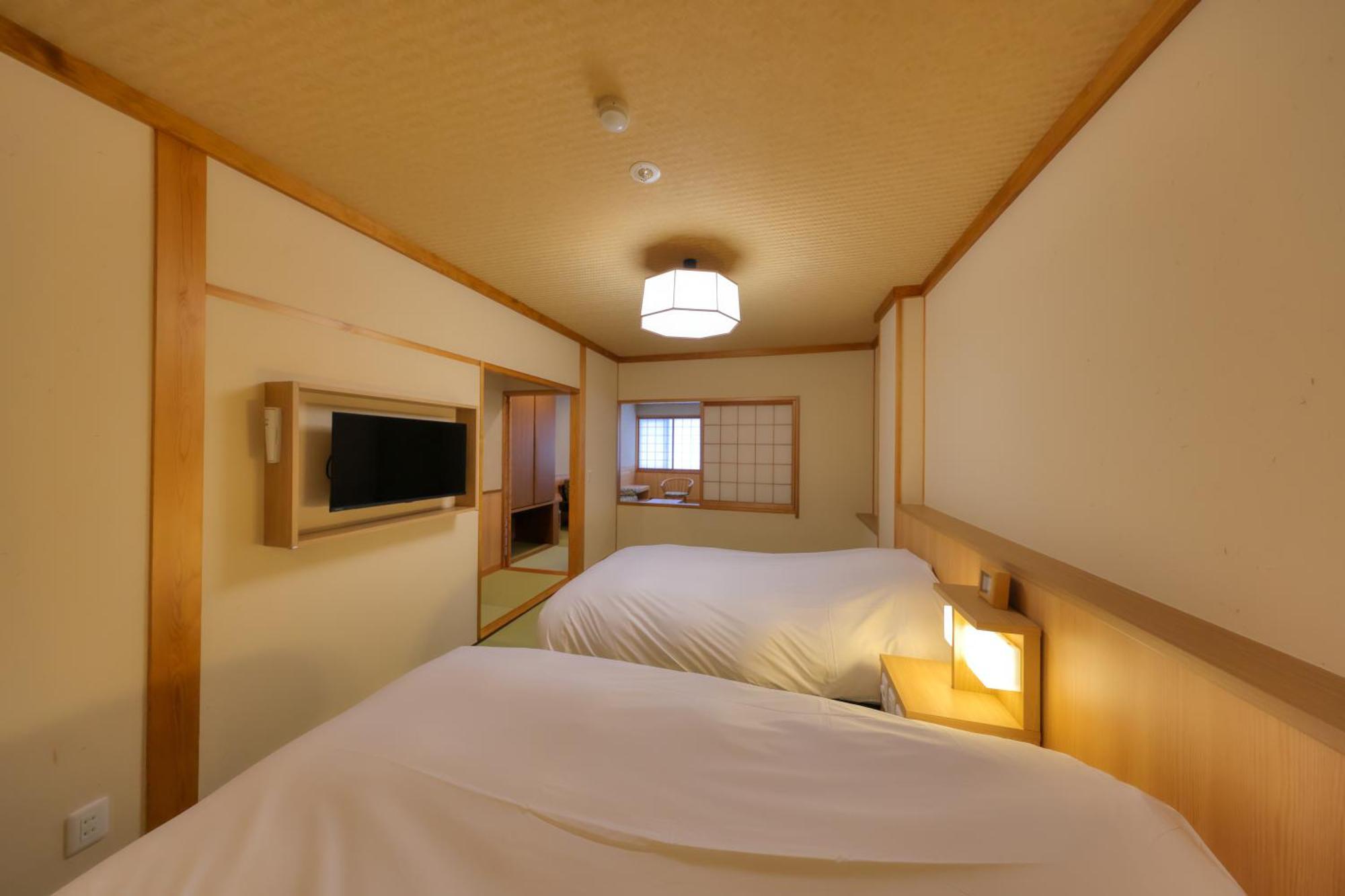 Miyama Ouan Kyoritsu Resort Takajama Kültér fotó A room at the hotel