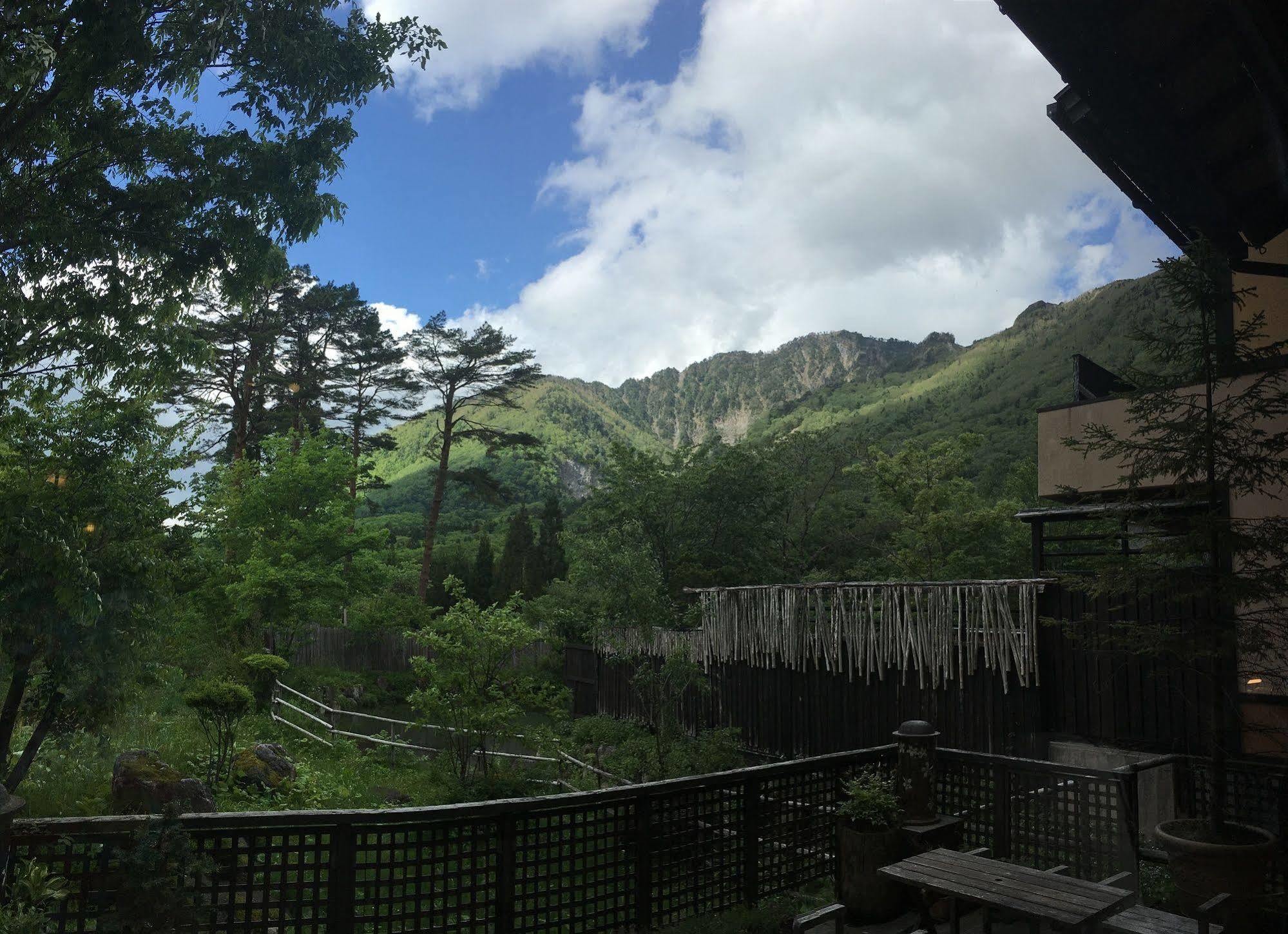 Miyama Ouan Kyoritsu Resort Takajama Kültér fotó View of Mount Takami from the Takami Lodge